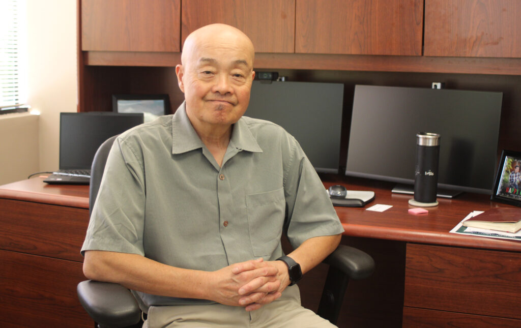 Professor Timothy Fong sits inside his Sacramento State University office. Fong is the executive director of the Asian American, Native Hawaiian and Pacific Islander Student Achievement Program. (Photo by Kat Tran.)