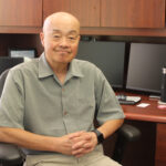 Professor Timothy Fong sits inside his Sacramento State University office. Dr. Fong is the executive director of the Asian American, Native Hawaiian and Pacific Islander Student Achievement Program. (Photo by Kat Tran.)